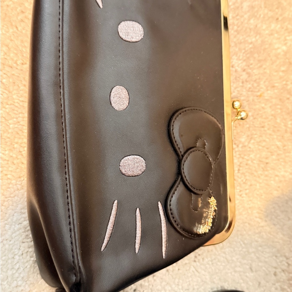 Hello Kitty Black Wristlet with Minimalist Face Design